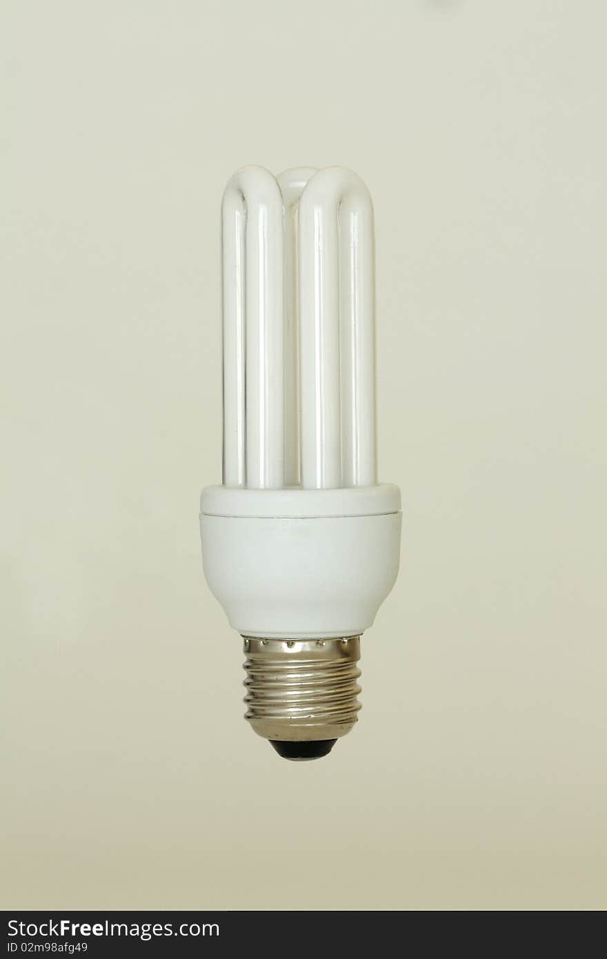 A energy saving light bulb on a white background