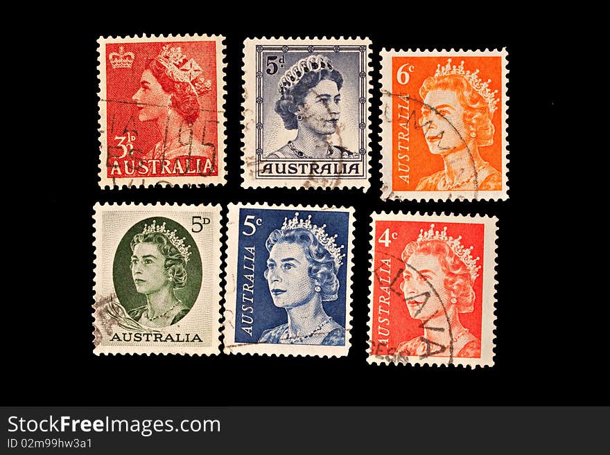 Vintage postage stamps from Australia with a young Queen Elizabeth II. Vintage postage stamps from Australia with a young Queen Elizabeth II