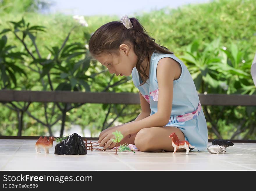 Portrait of little girl having good time in summer environment. Portrait of little girl having good time in summer environment