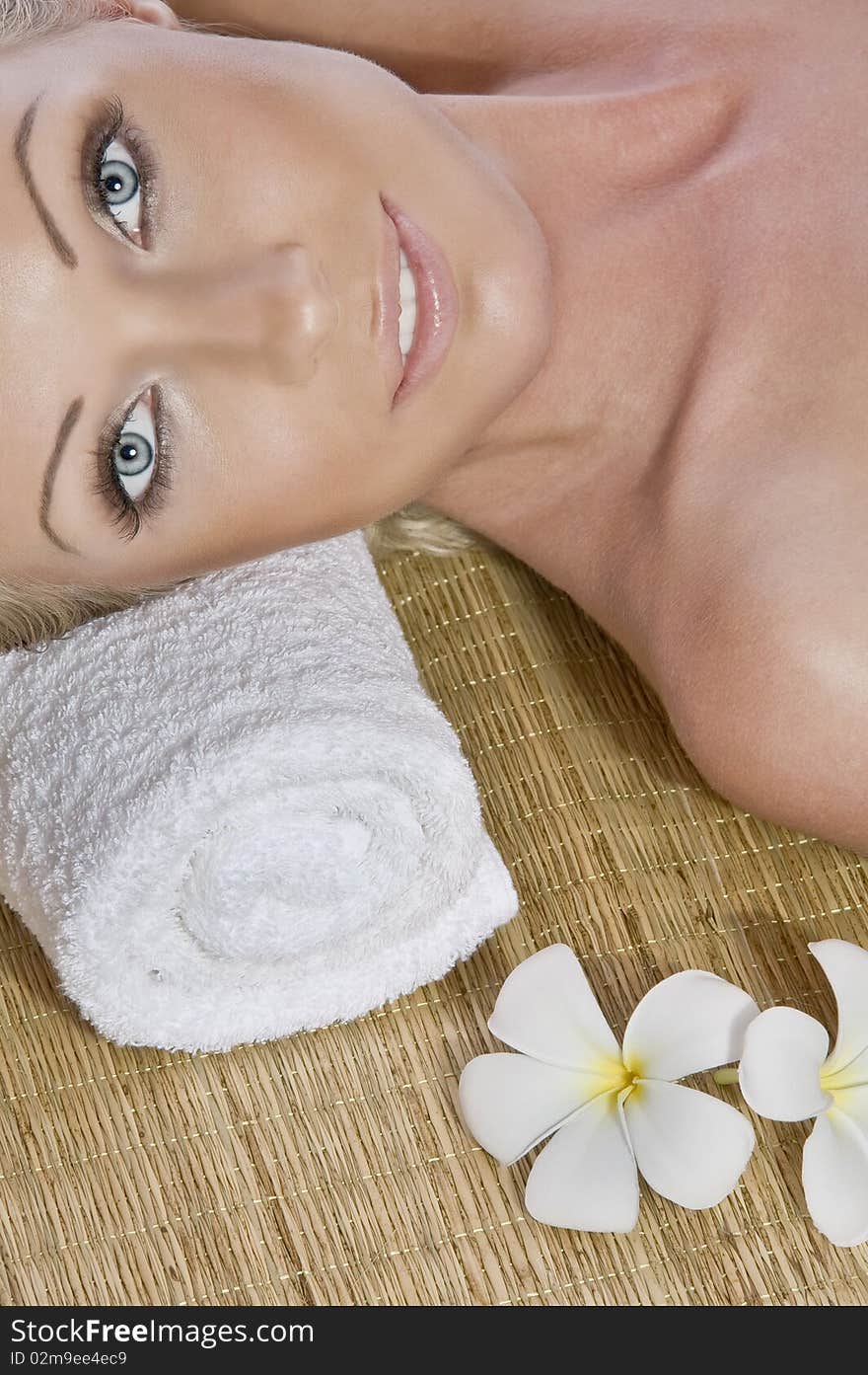 Portrait of young beautiful woman in spa environment. Portrait of young beautiful woman in spa environment