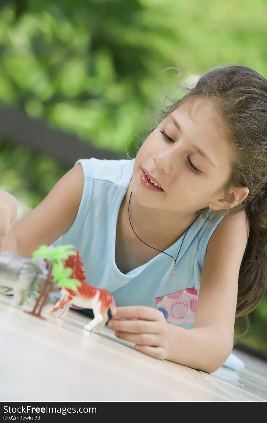 Portrait of little girl   having good time in summer environment. Portrait of little girl   having good time in summer environment