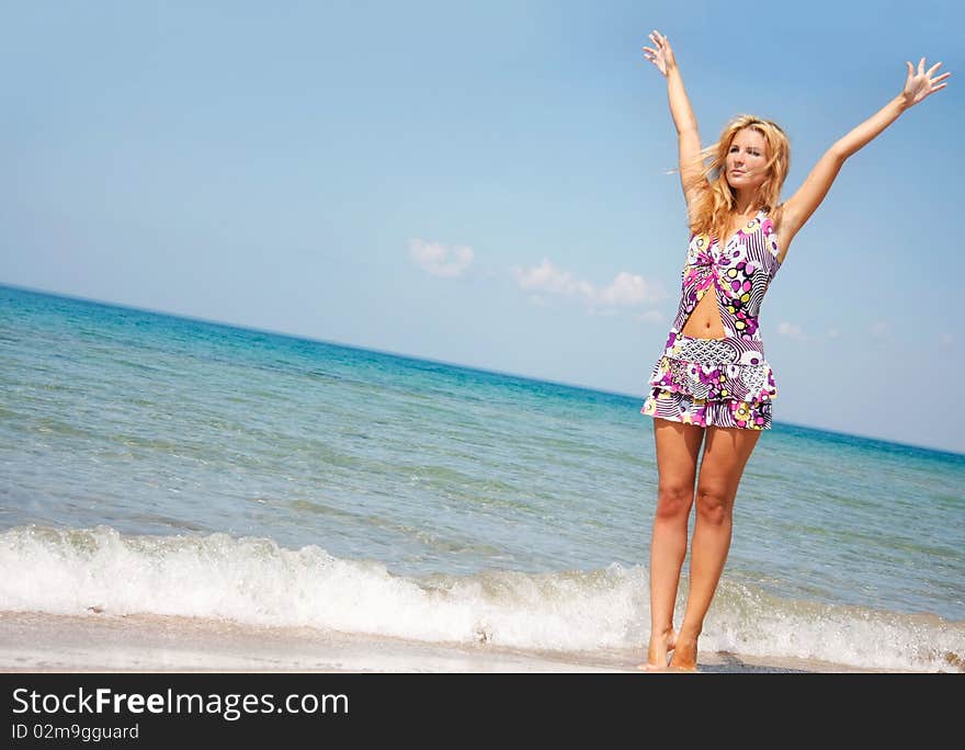 Happy girl on sea background