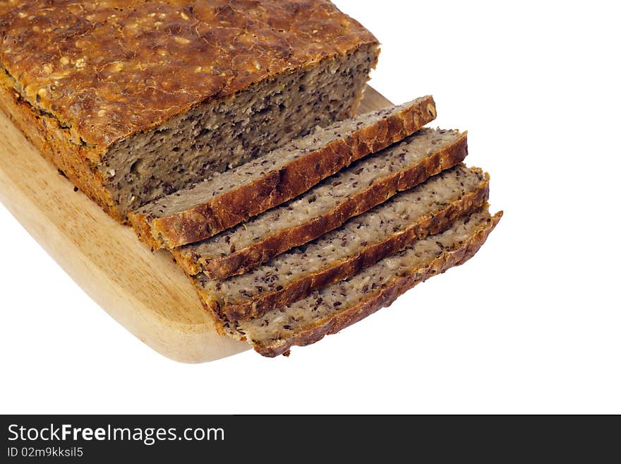 Rye bread on wooden board isolated white background