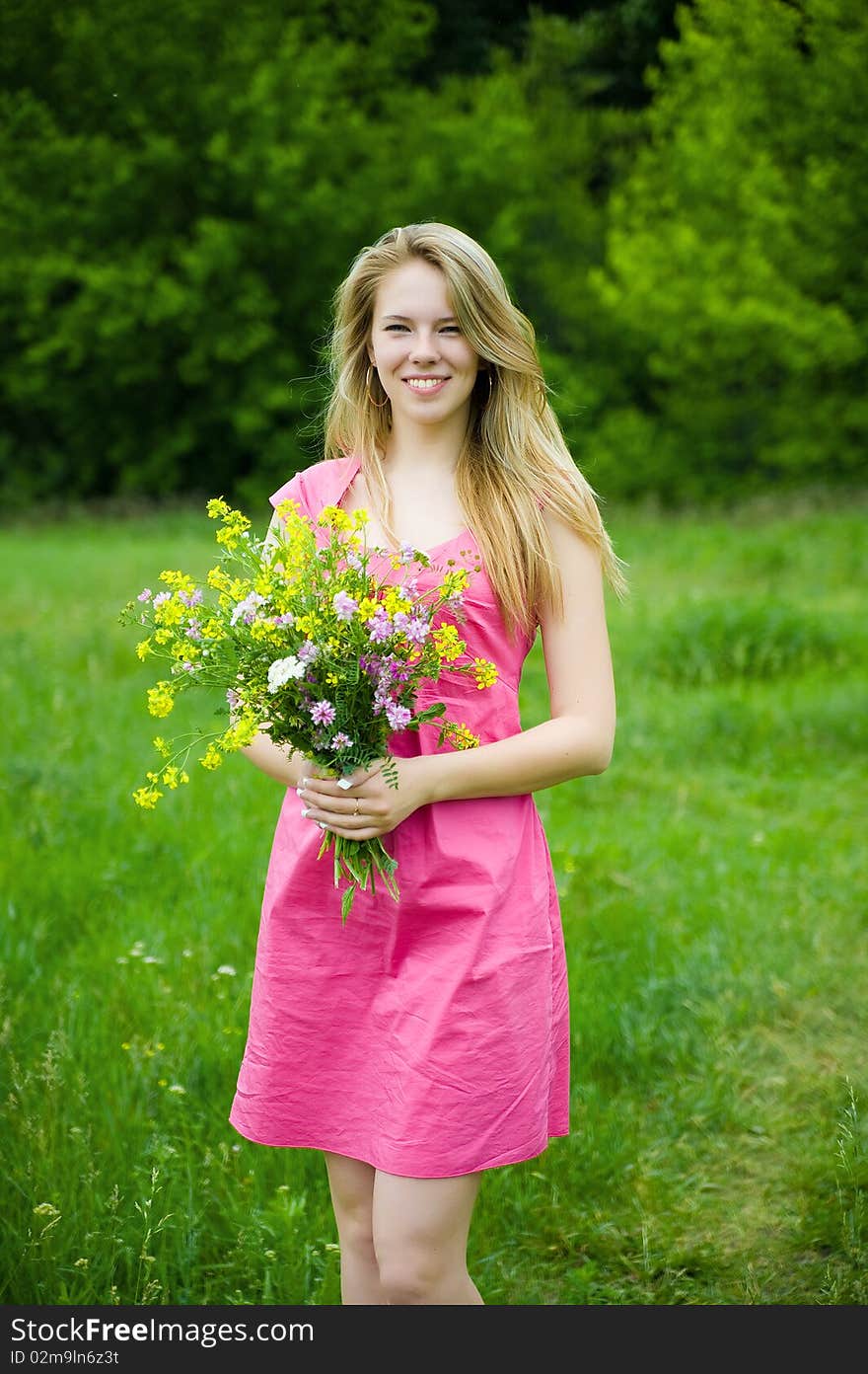 Pretty Woman With Bouquet Of Flowers