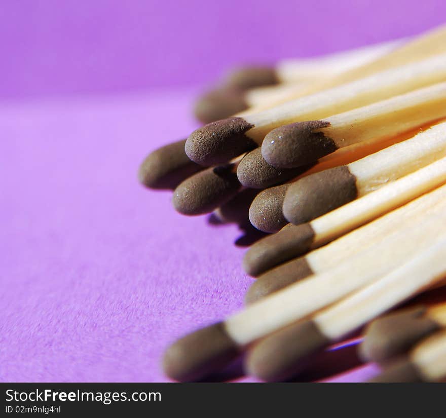 Matches On A Purple Background