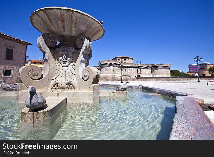 Della Rovere Medieval Castle in Senigallia and historic fountain in the square