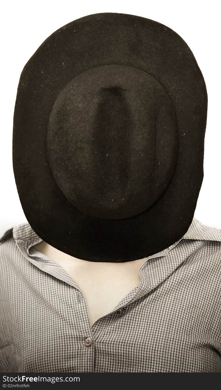 Woman with black hat covering face