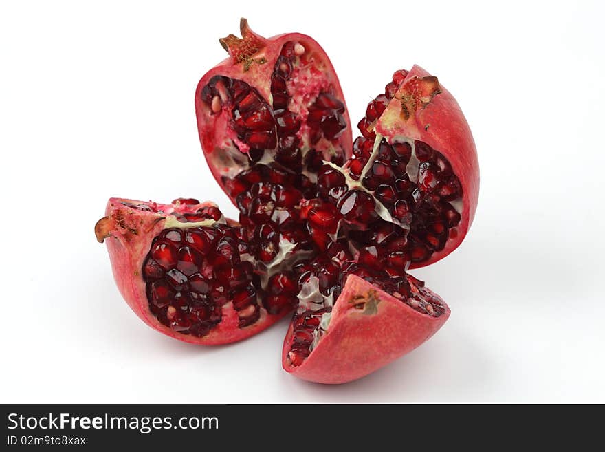 Red and Ripe Pomegranate, isolated on white. Red and Ripe Pomegranate, isolated on white