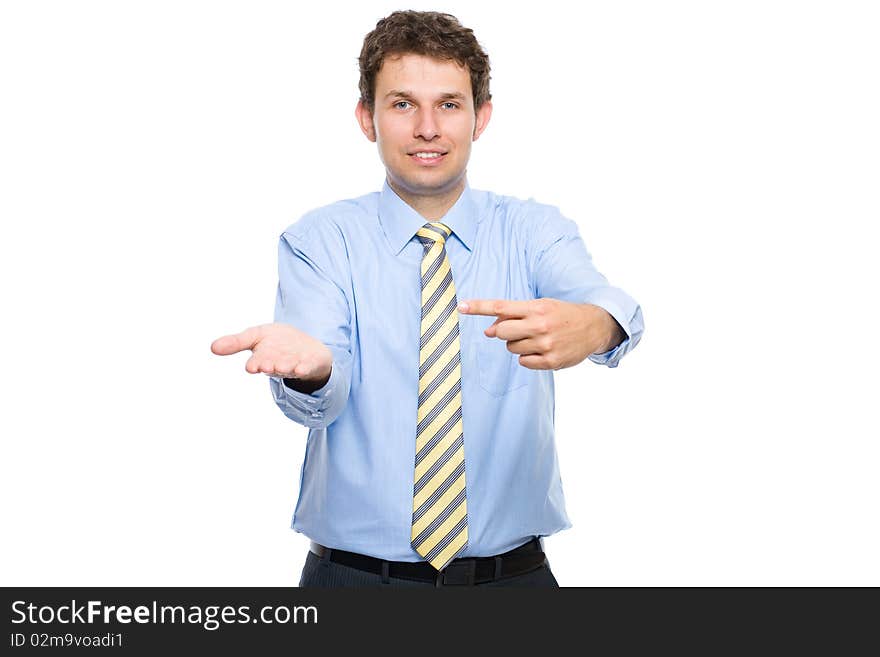 Young adult points with his finger to his other empty hand, advertisement concept, studio shoot isolated on white background. Young adult points with his finger to his other empty hand, advertisement concept, studio shoot isolated on white background