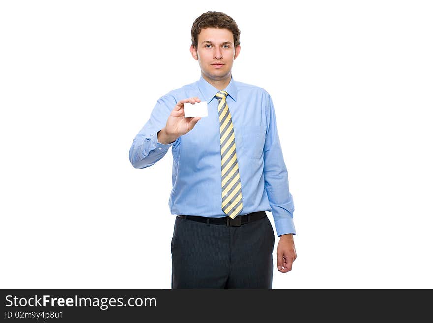 Young attractive businessman shows his business card, white empty copy space, studio shoot isolated on white background. Young attractive businessman shows his business card, white empty copy space, studio shoot isolated on white background