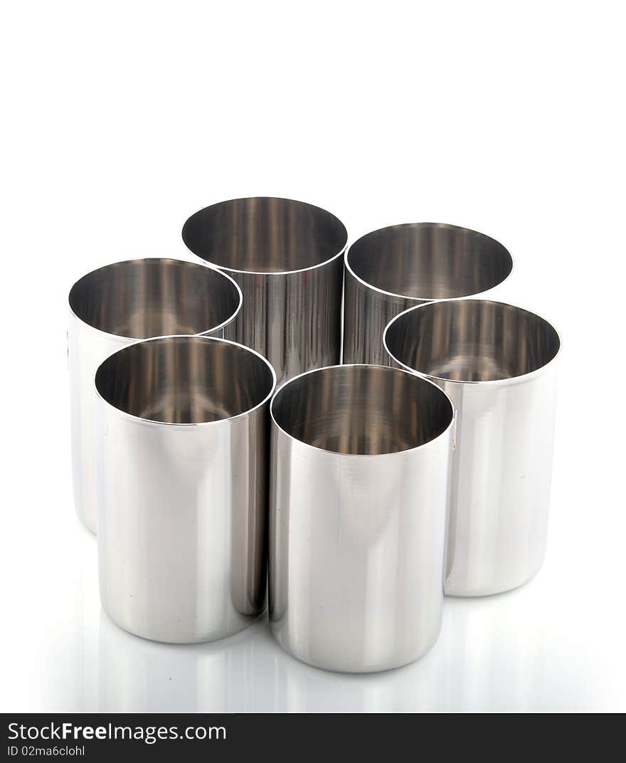 Stainless steel silver mugs on isolated background. Stainless steel silver mugs on isolated background