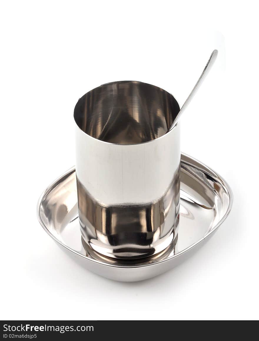 Stainless steel silver mug with plate and spoon. Stainless steel silver mug with plate and spoon