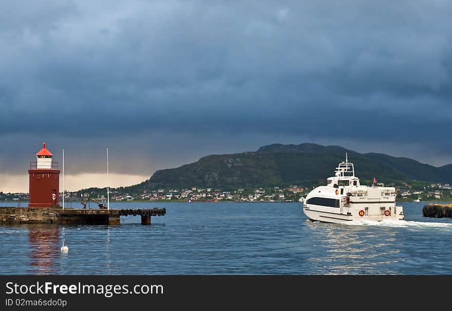 Alesund - one of the nicest cities of the northern Norway. Here there are many old and modern wharfs for both small fishing vessels and cruise ships. Alesund - one of the nicest cities of the northern Norway. Here there are many old and modern wharfs for both small fishing vessels and cruise ships