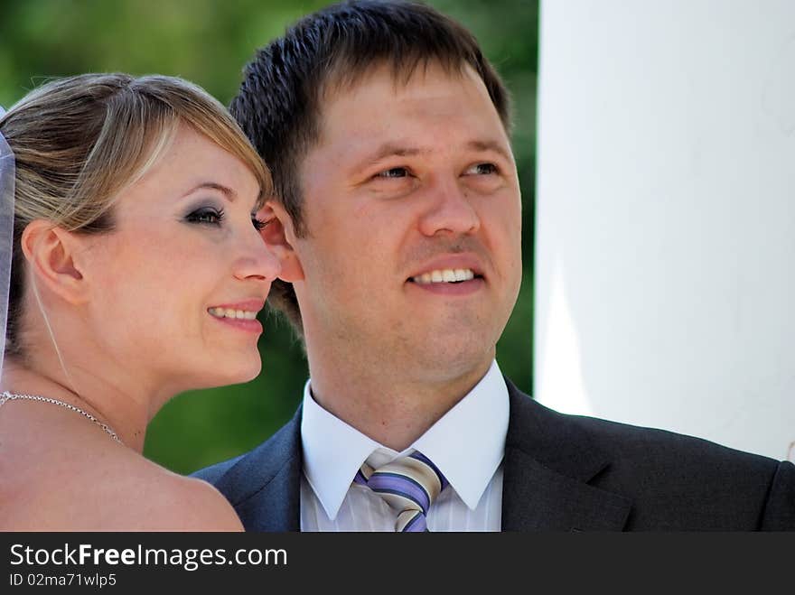 Portrait of a happy young couple in park