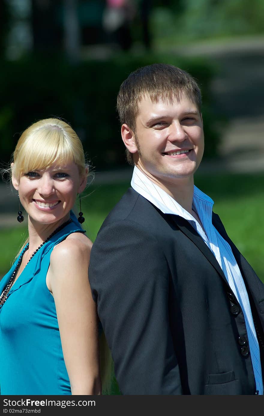 Portrait of a happy young couple in park