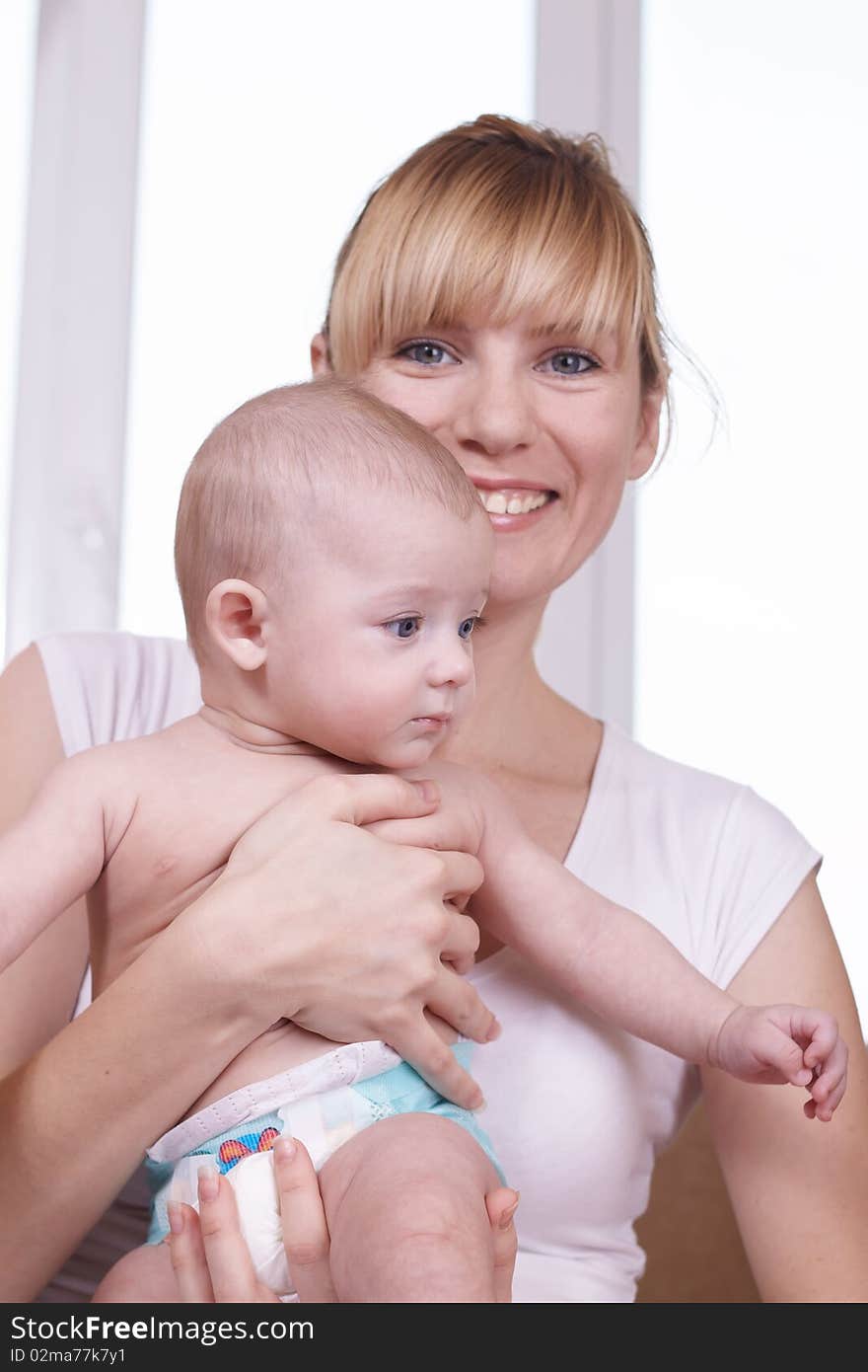 Portrait of the newborn child near to mum. Portrait of the newborn child near to mum