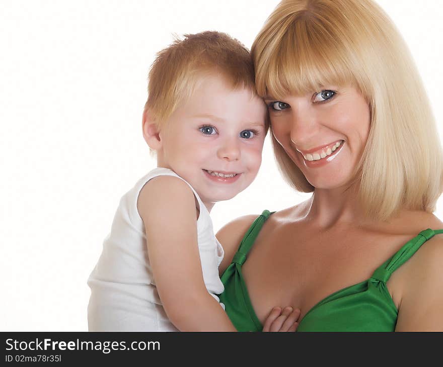 Young mum with the small son on a white background. Young mum with the small son on a white background