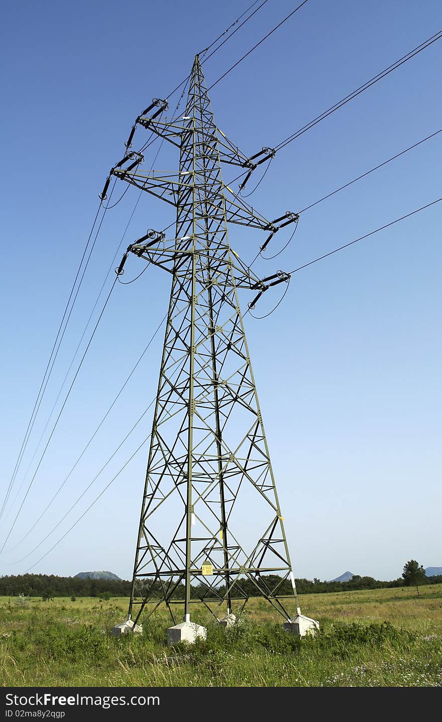 High tension line on the meadow