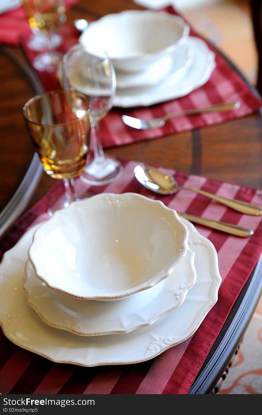 Plate and spoon on table