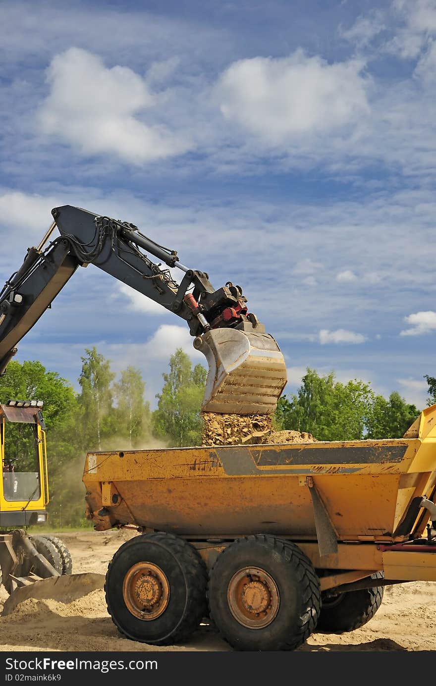 Process of loading sand into a truck