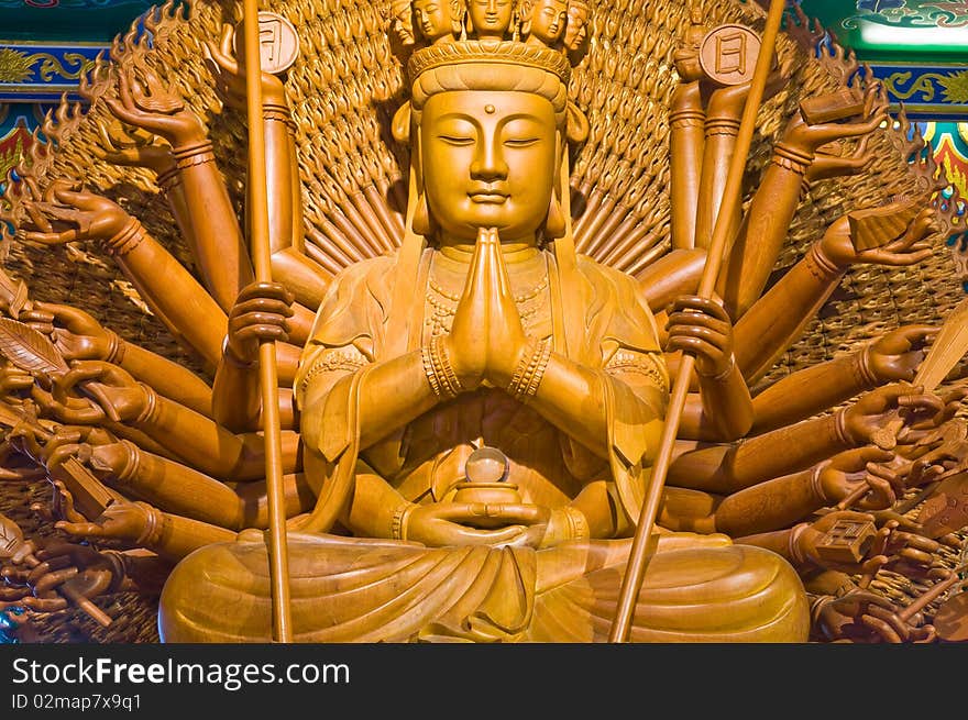 Wooden Buddha in a Chinese temple.