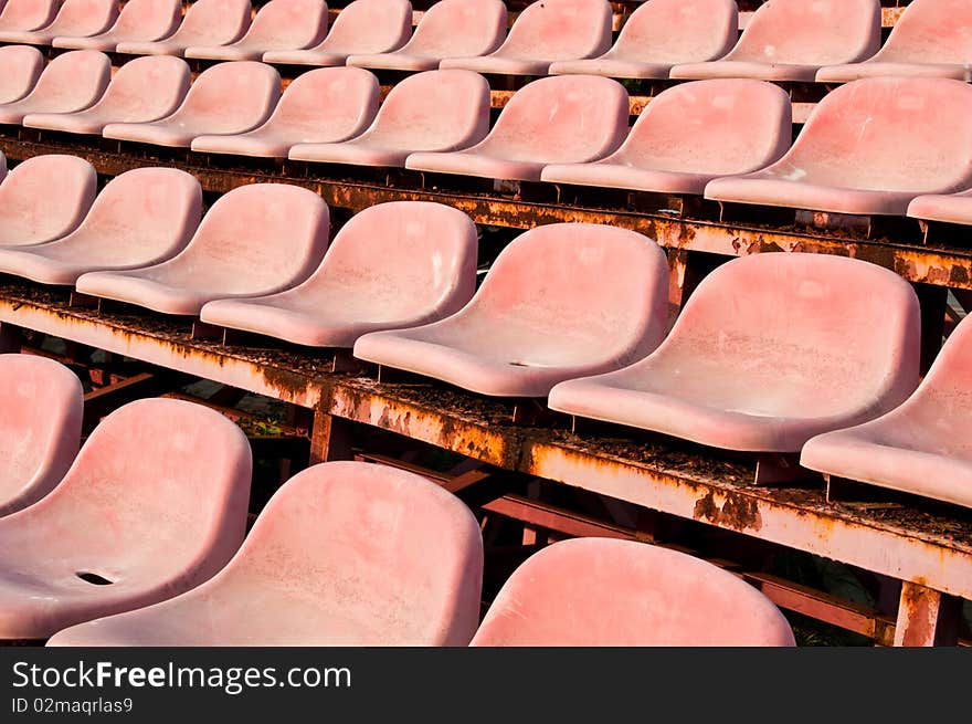 Old red seats in a Stadium