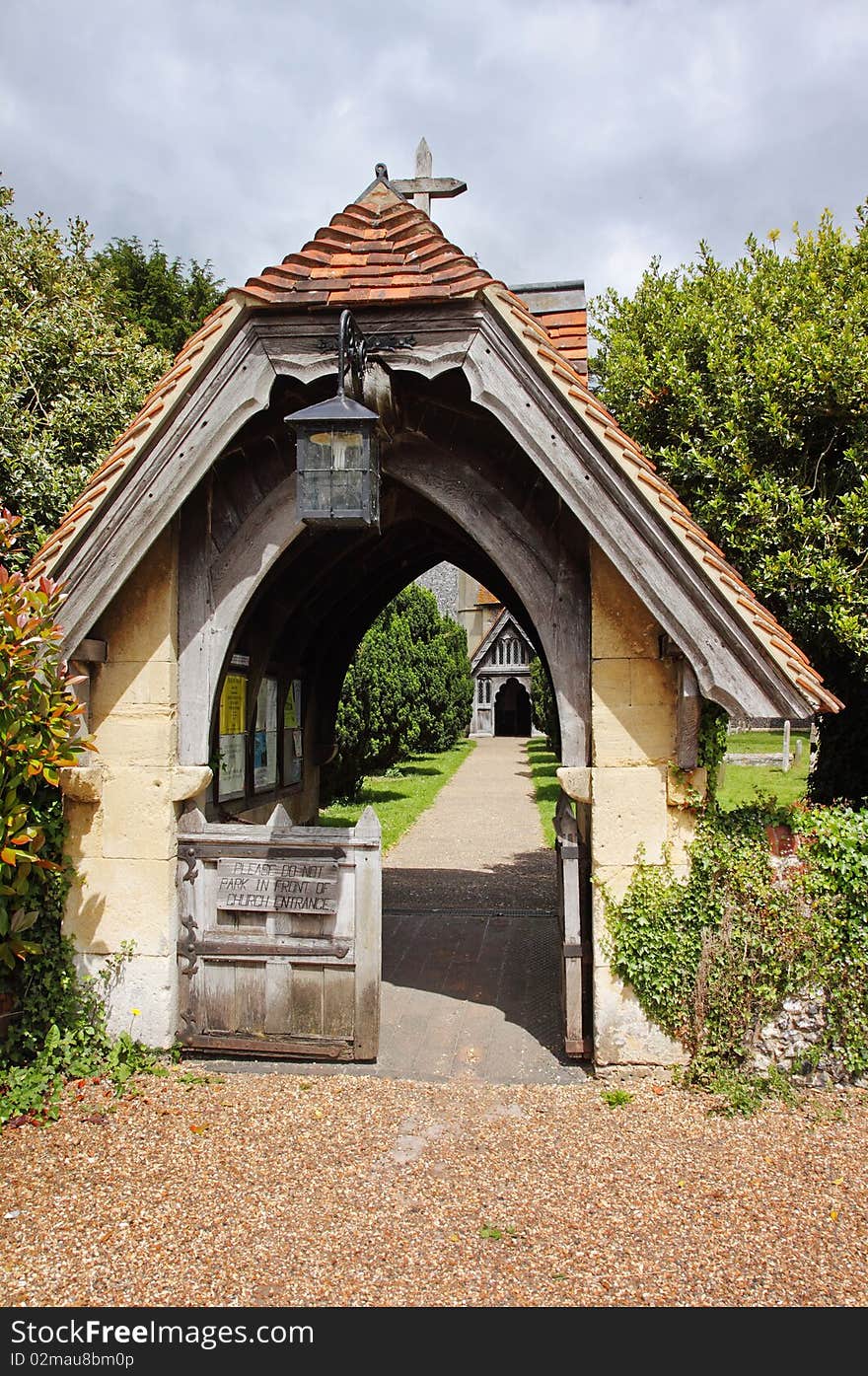 English Village Lychgate with path leading to Church. English Village Lychgate with path leading to Church