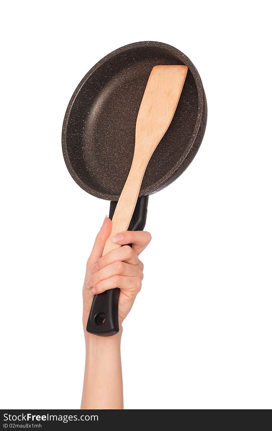 Woman holding frying pan for cooking in the hand