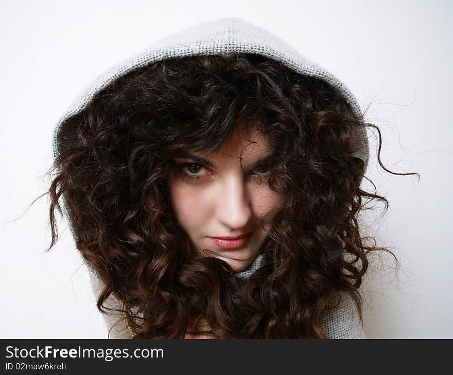 Young girl in hood posing