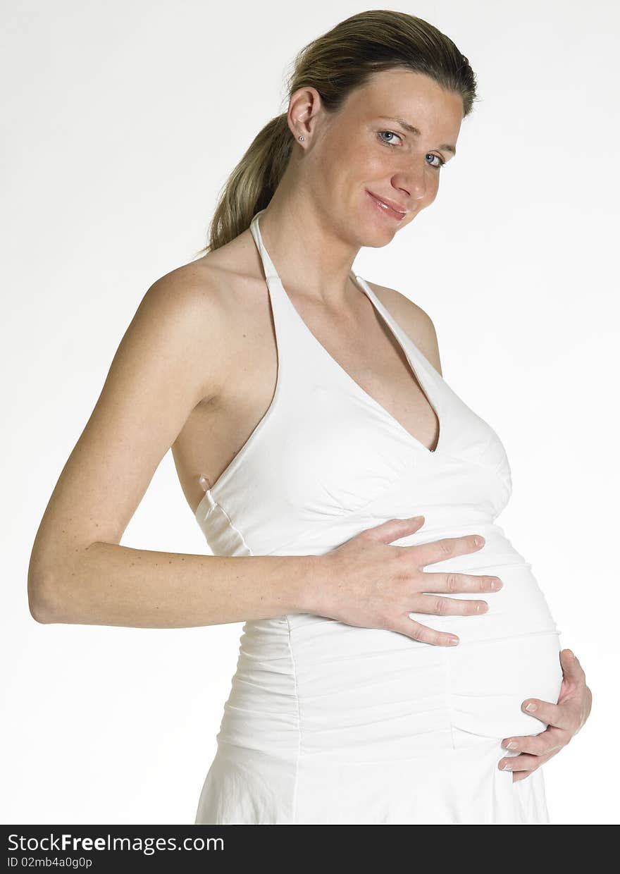 Portrait of standing pregnant woman