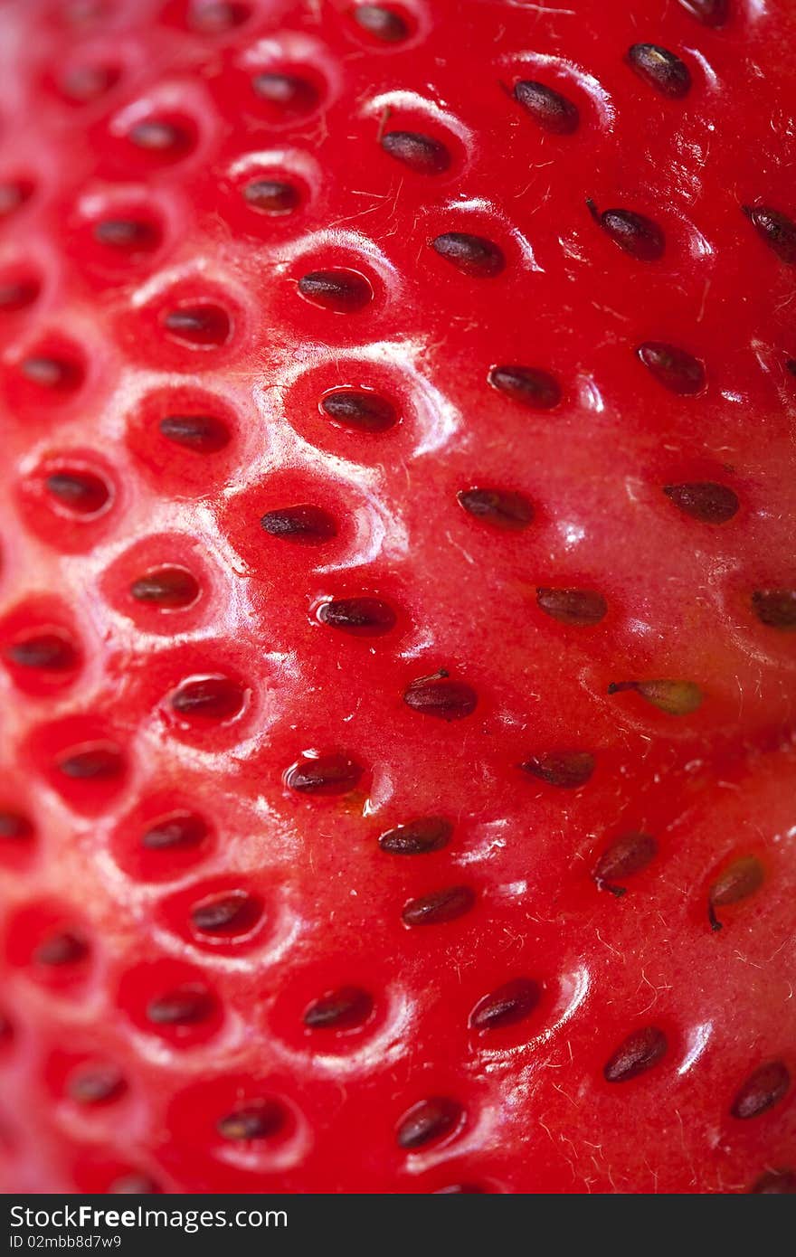 Close up on a strawberry's skin.