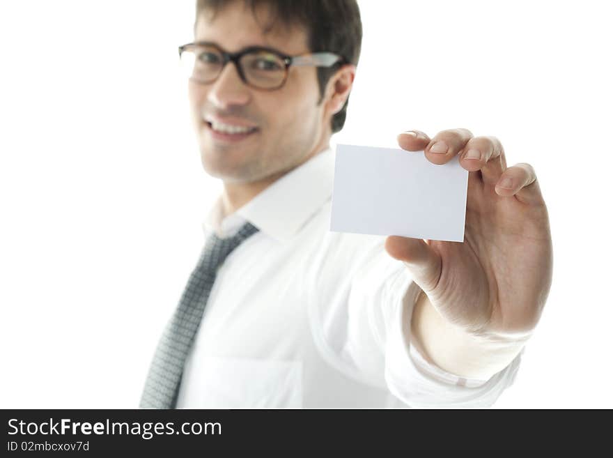 Businessman with blank businesscard, focus on foreground. Copy space for your own text.