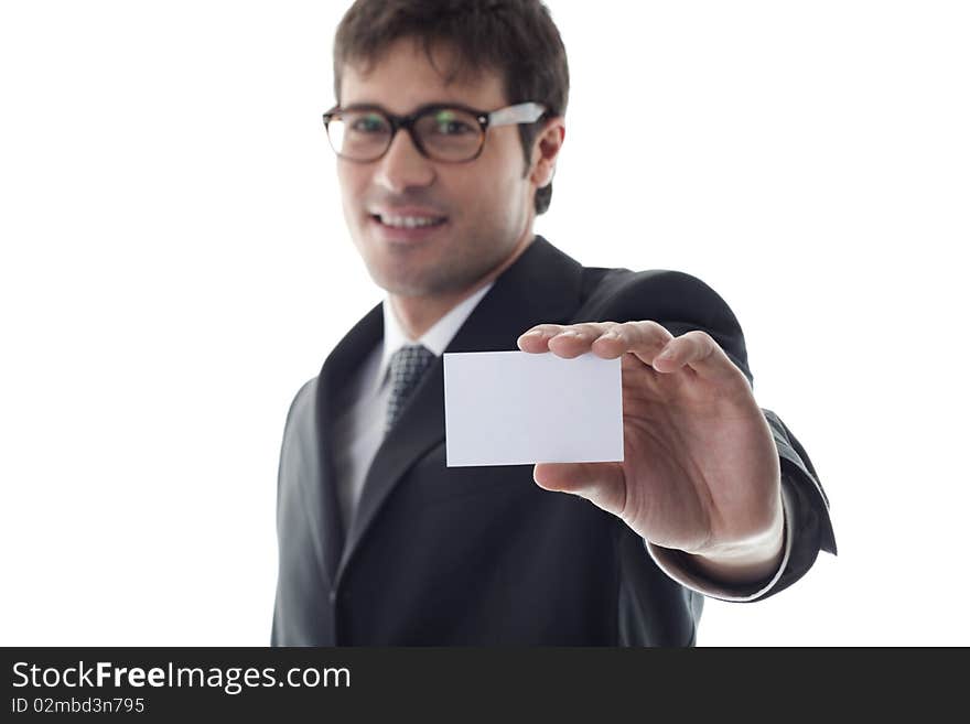 Businessman with blank businesscard, focus on foreground. Copy space for your own text.