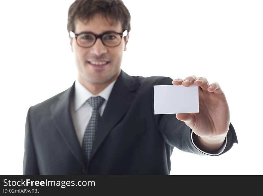 Businessman with blank businesscard, focus on foreground. Copy space for your own text.