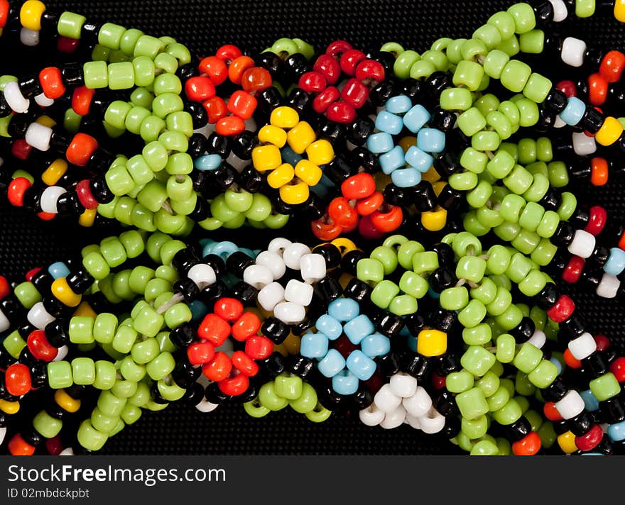 Closeup of  intricate traditional african bead work