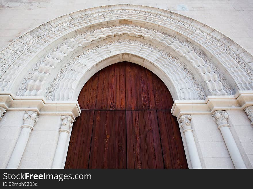 Wooden door in church on Sicily Island