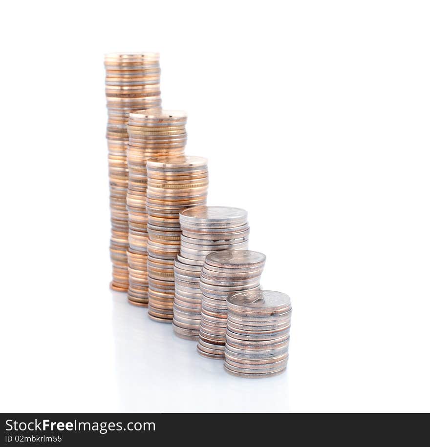 Coins  towers on white background