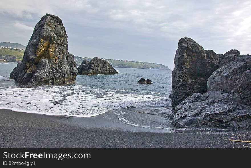 Offshore rocks formations in the mediterranean sea in Italy