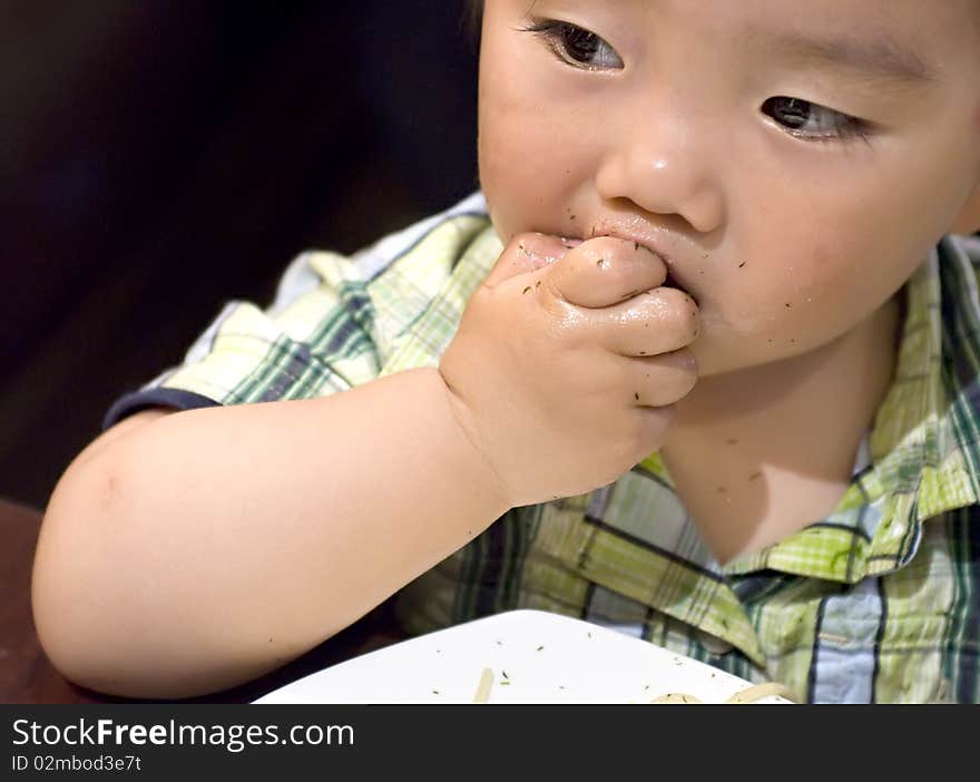 Eating baby to grab pasta