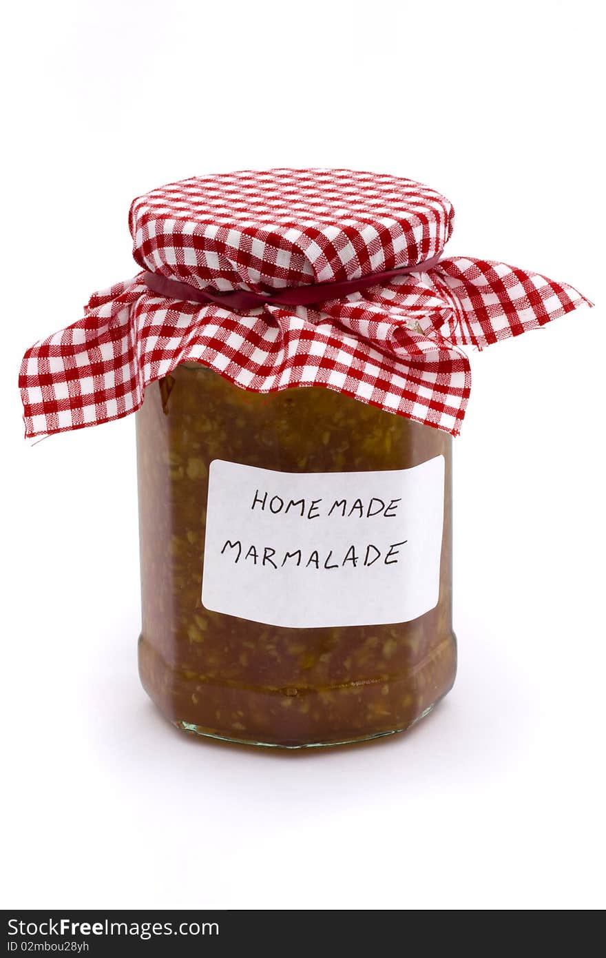 Jar of homemade marmalade on a white background. Jar of homemade marmalade on a white background