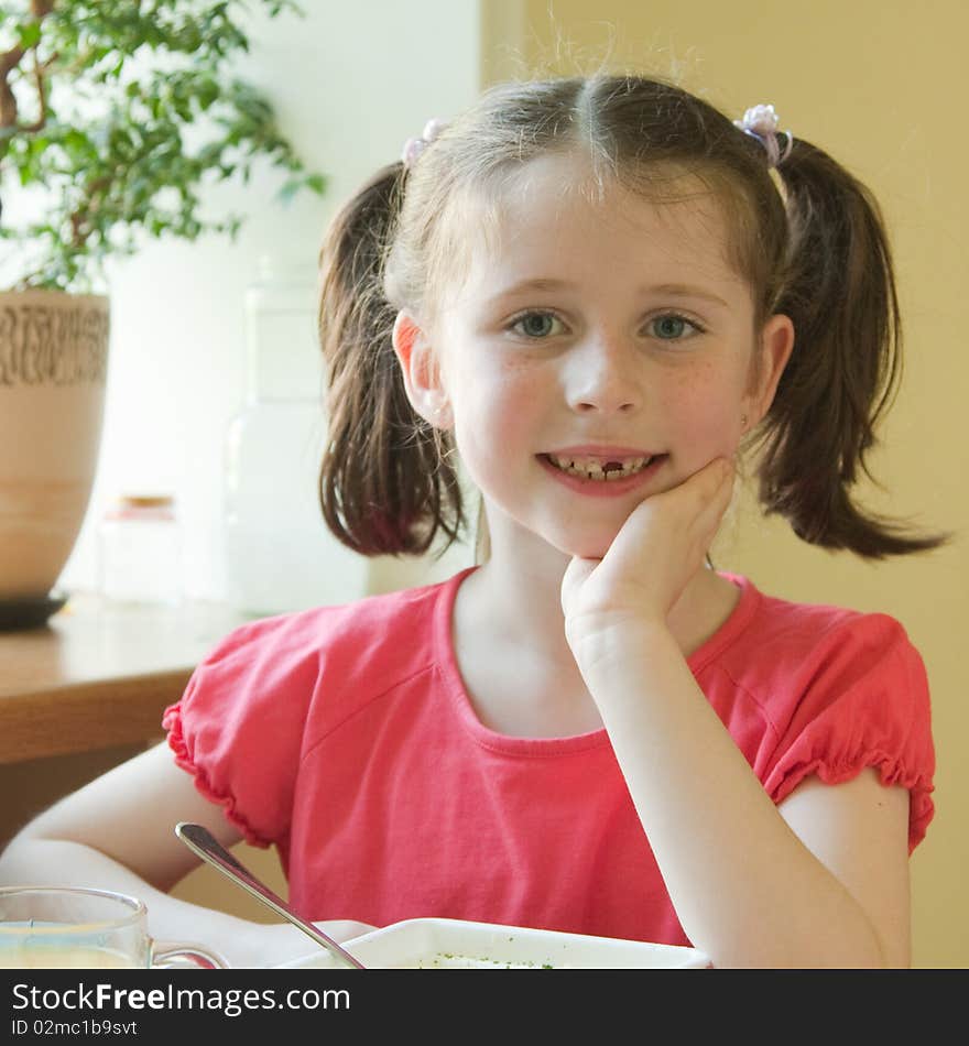 Portrait of a girl without a front tooth. Portrait of a girl without a front tooth