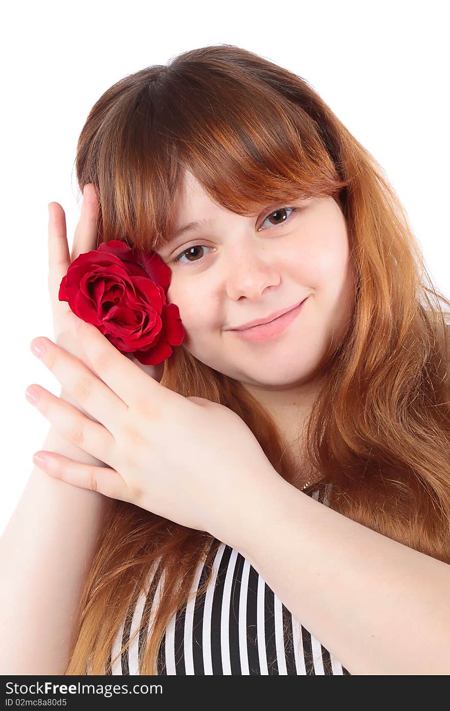 Smiling young woman with flower