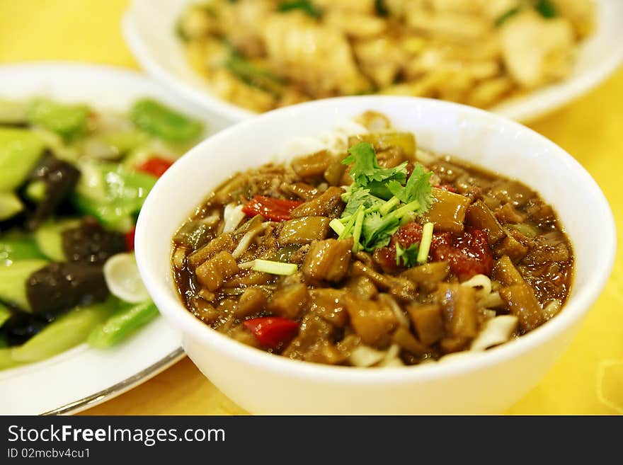 Delicious Chinese noodles on the table(with eggplant sauce ).