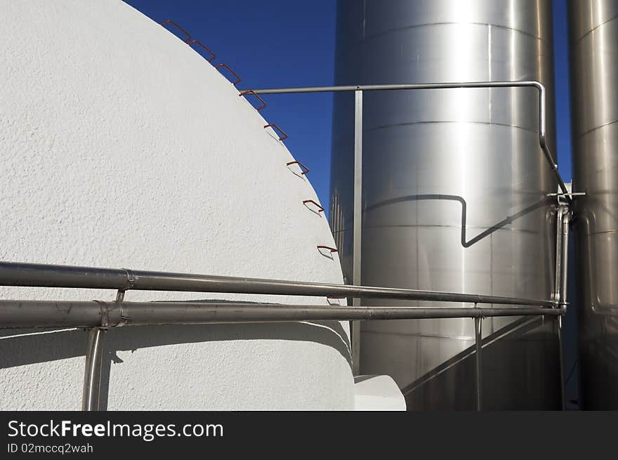 Stainless steel and concrete tanks in a winery, Alentejo, Portugal