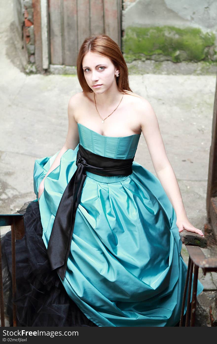 Red haired girl on the stairs