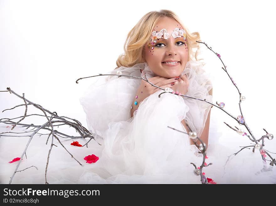 Beautiful fairy girl with tree branch