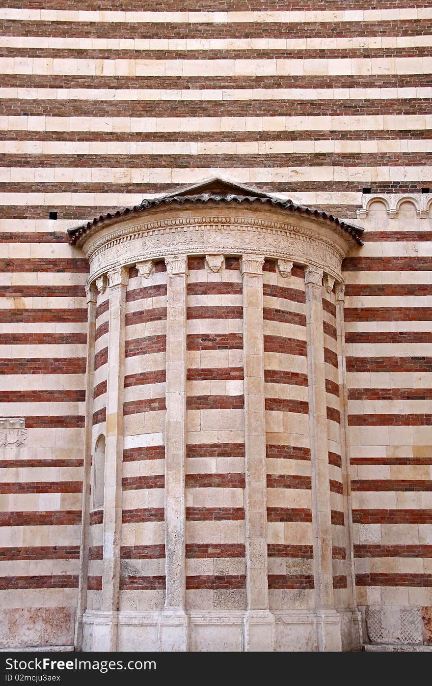 Architectural detail of a wall of The Duomo church bell tower in Verona, Italy. Architectural detail of a wall of The Duomo church bell tower in Verona, Italy