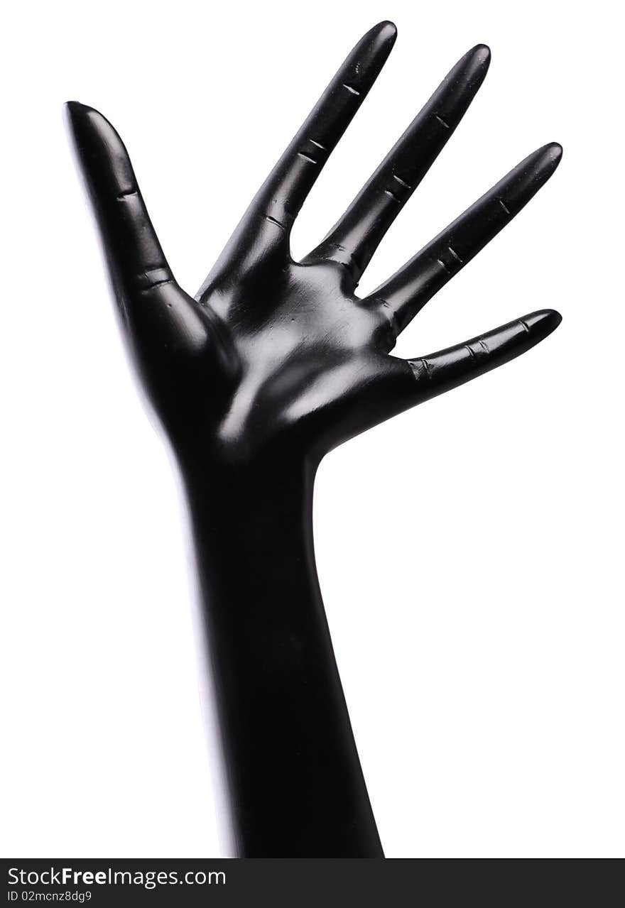 One black artificial hand isolated at white background