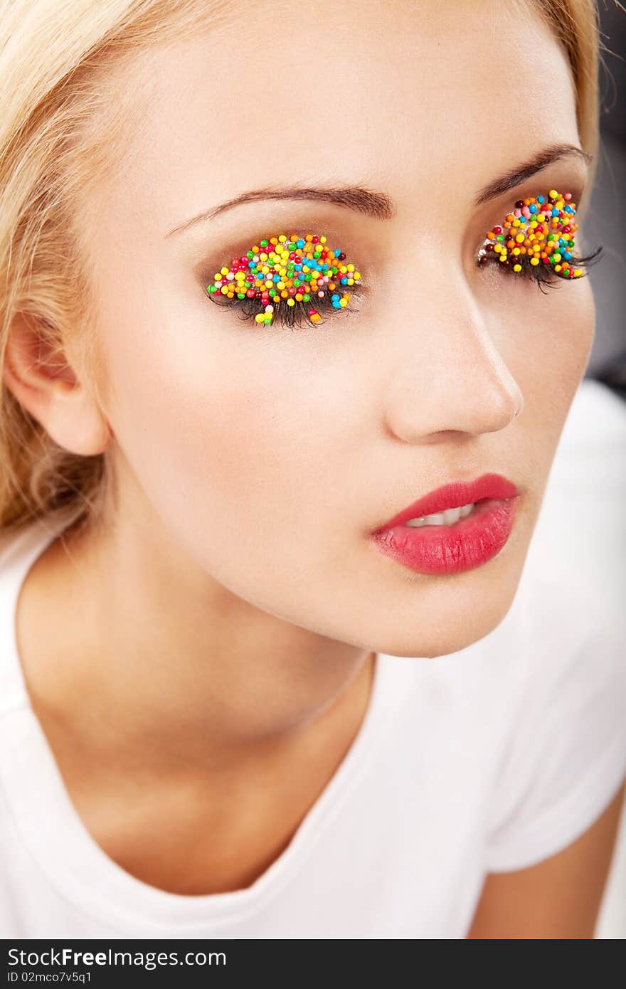 Beautiful blond woman with bright easter makeup. Beautiful blond woman with bright easter makeup