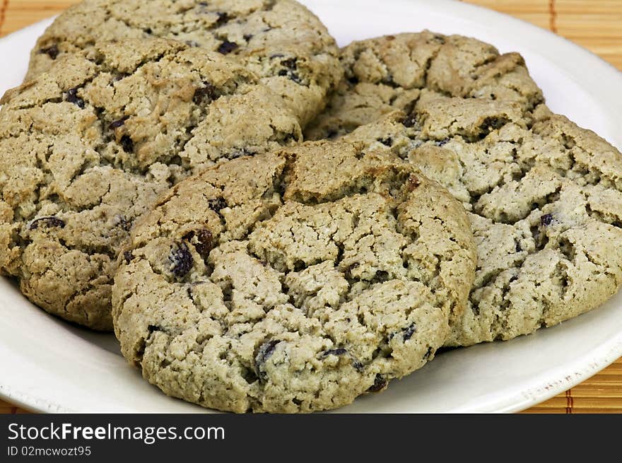 Fresh oatmeal raisin cookies on a plate